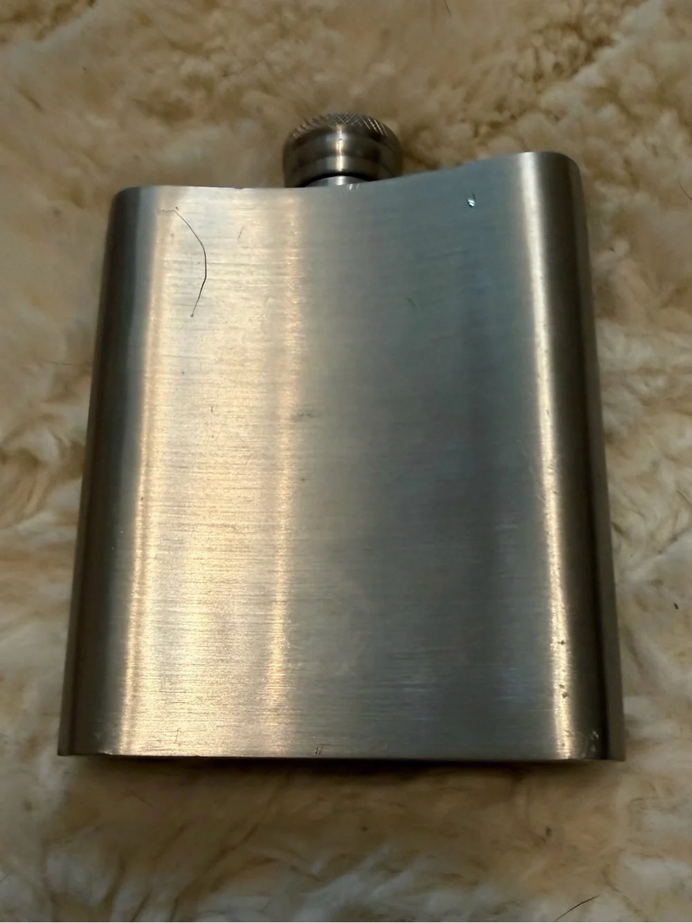 New Silver flask inscribed with “Over the Hill”